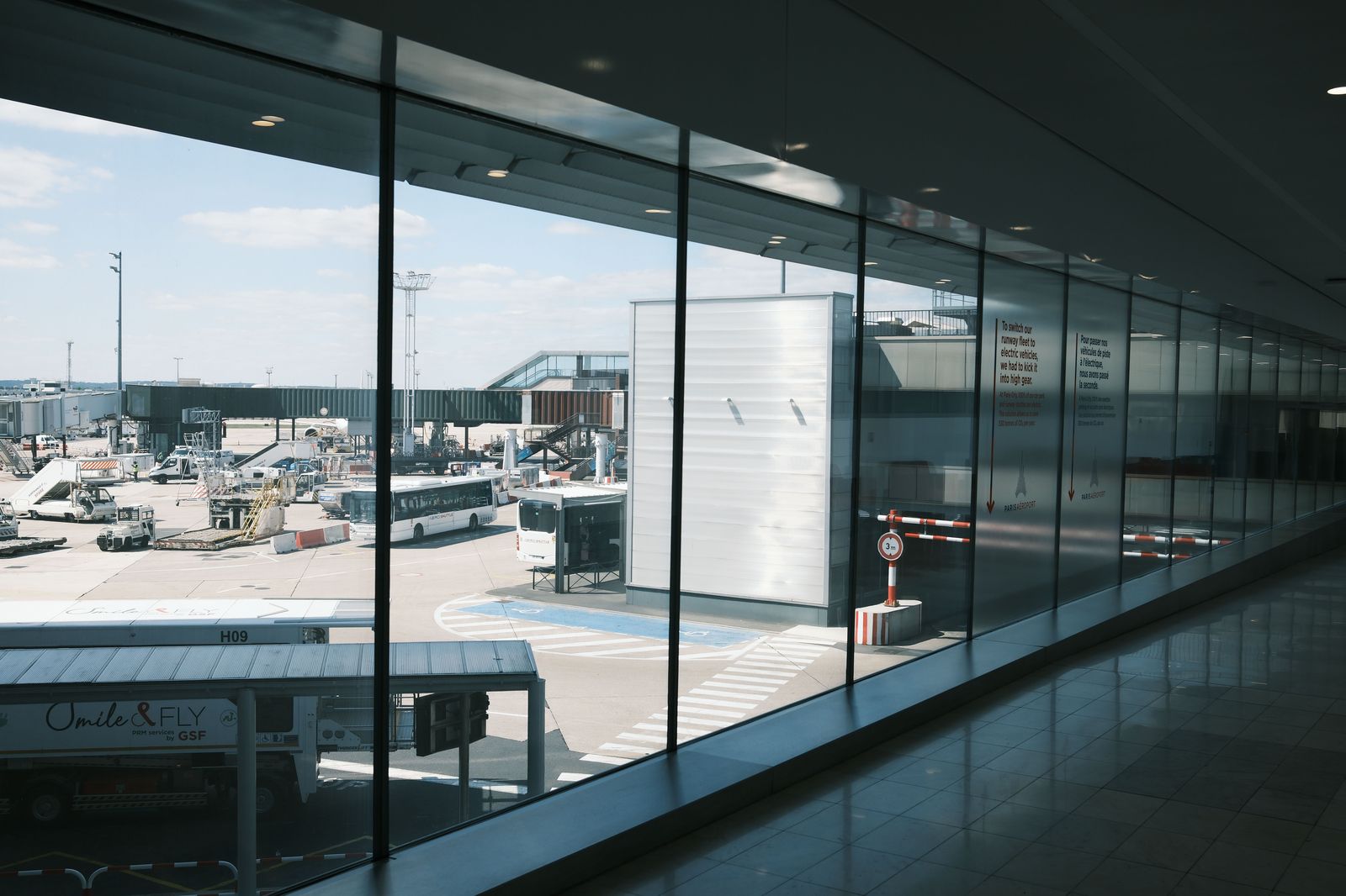 A scheduled coach at the terminal: the private car is the door-to-door alternative on your own timetable