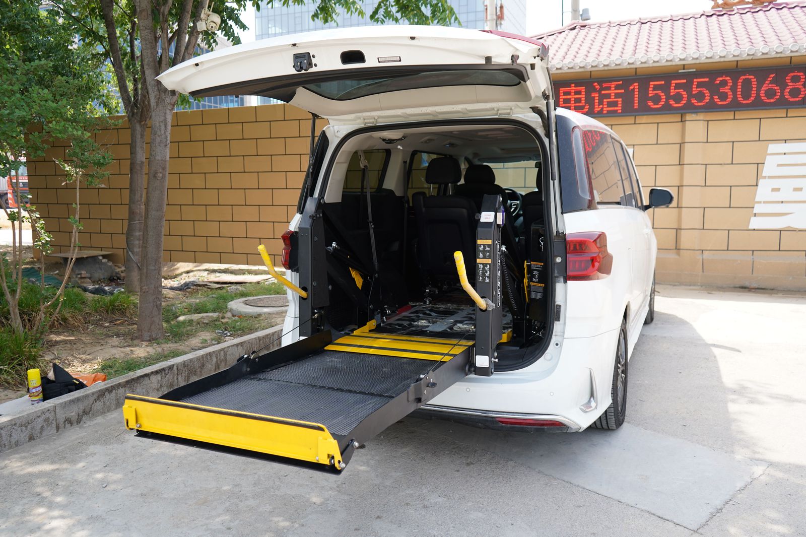 Luggage being loaded into a van in a suburban driveway after a Delhi flight