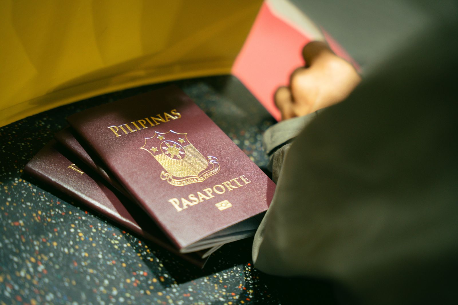 Travellers waiting in line at airport passport control