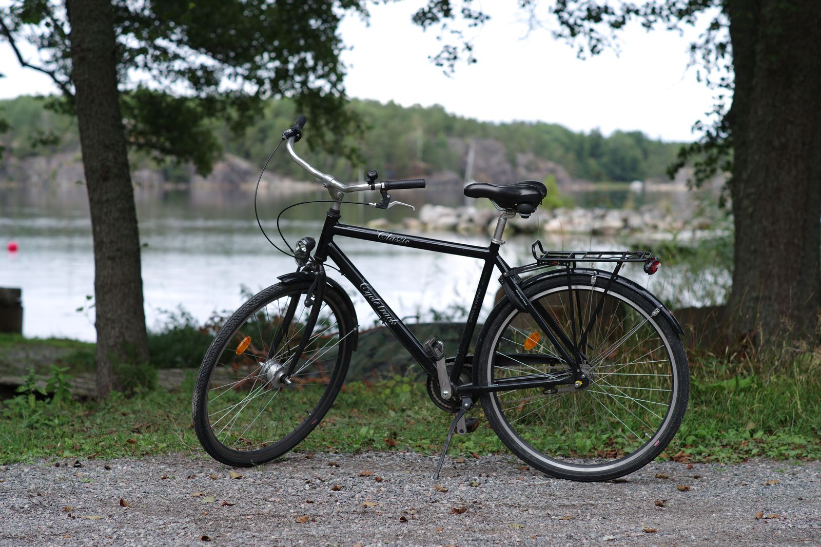 Cyclists on the Island paths with Lake Ontario beside them in summer
