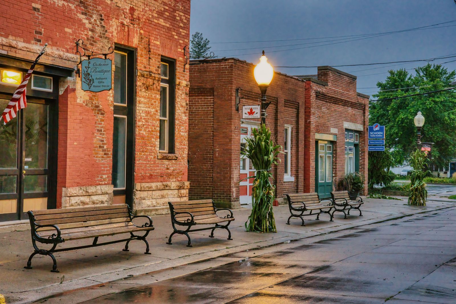 The flower baskets and heritage storefronts of Queen Street in the old town