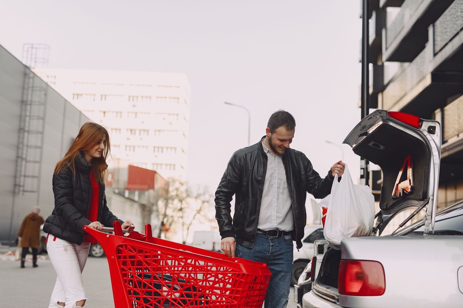 Shopping bags go in the trunk, not on your lap - the main reason families book a car for outlet days