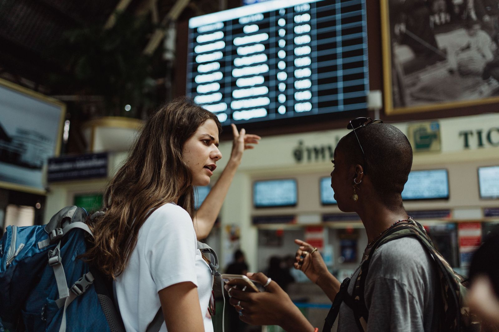 Checking the departures board before heading into the city on a long connection