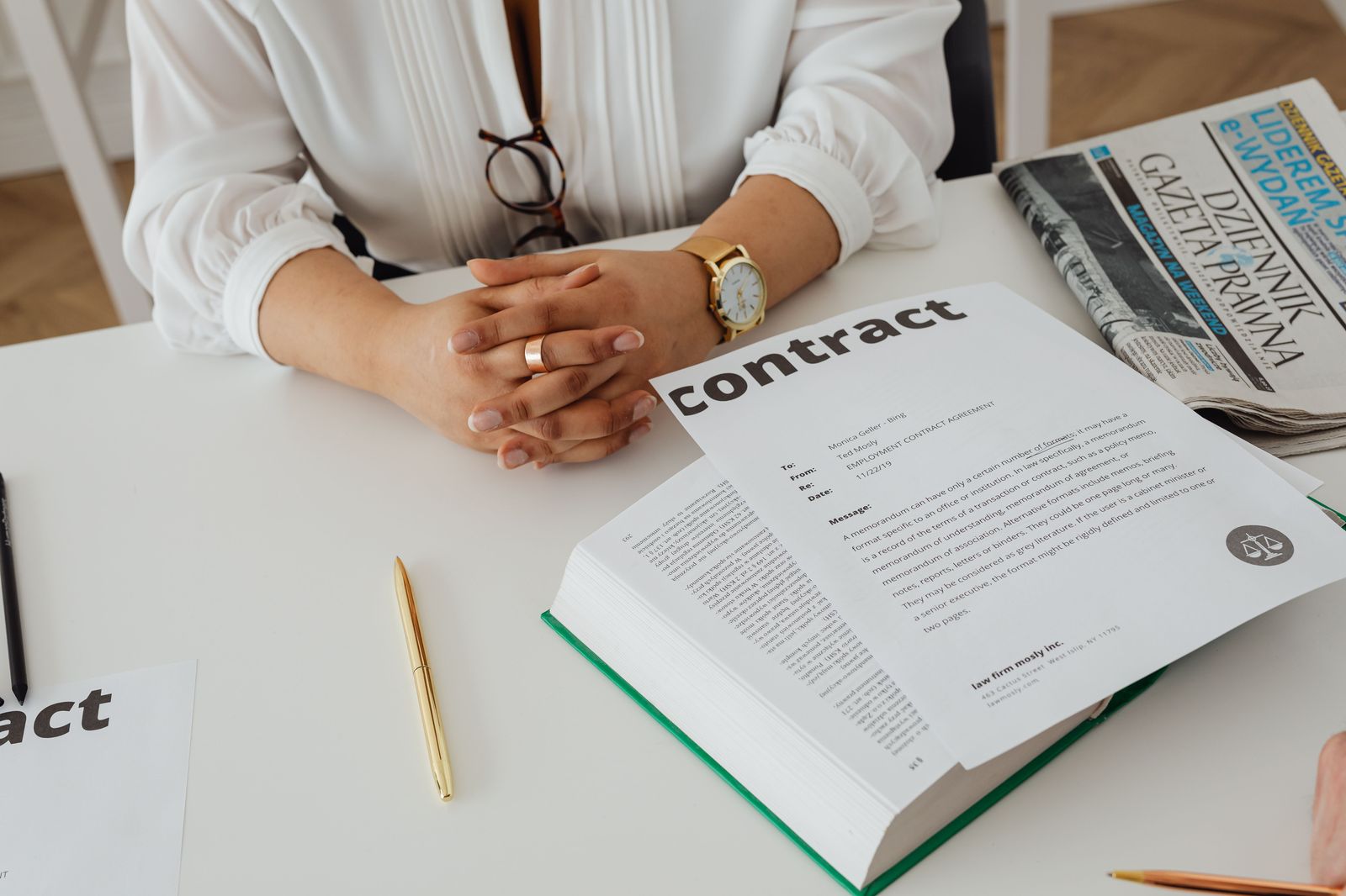 A person reading a limousine contract on a phone before booking