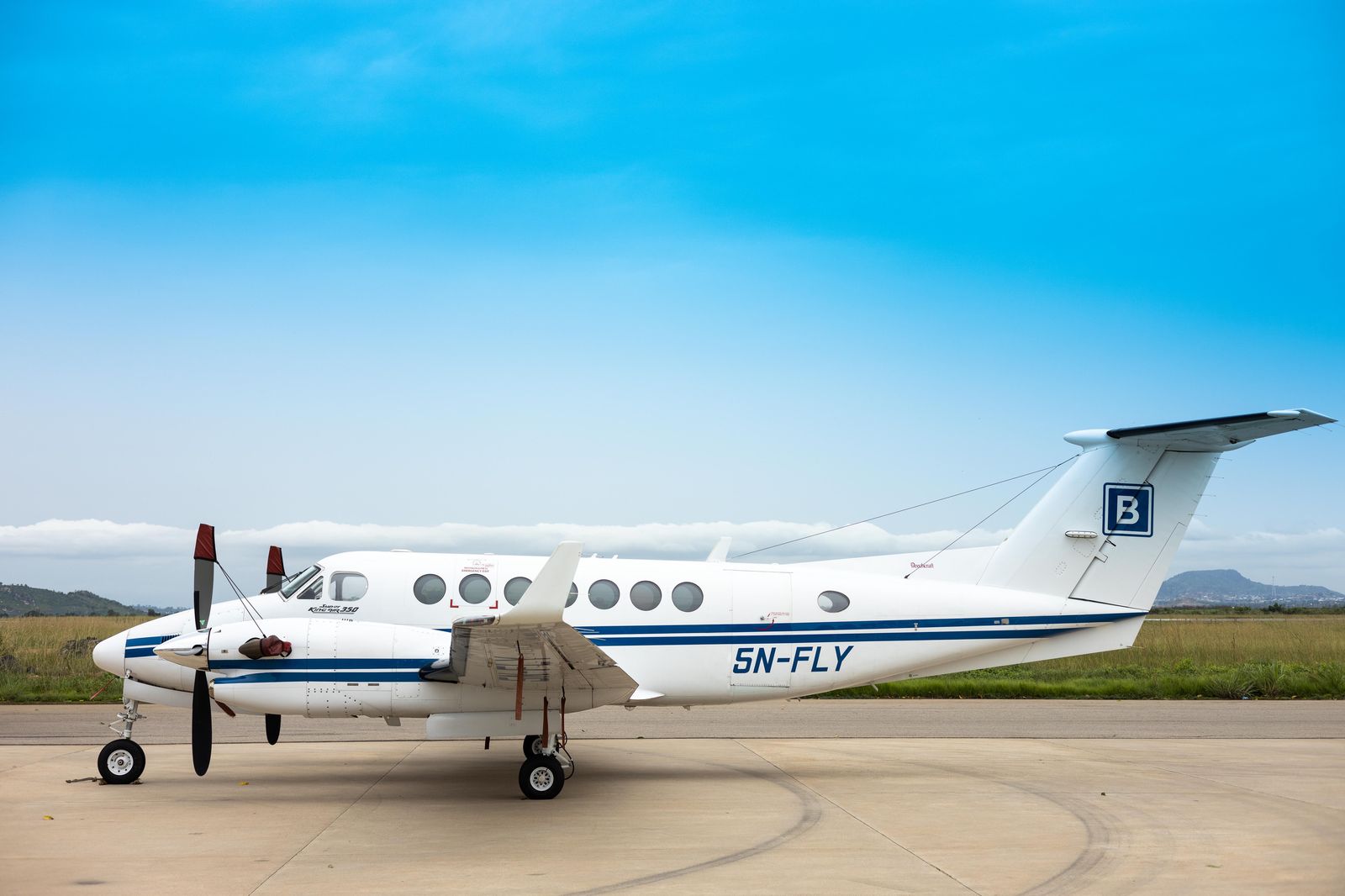 A small airliner on the runway at a regional airport of the kind Hamilton offers
