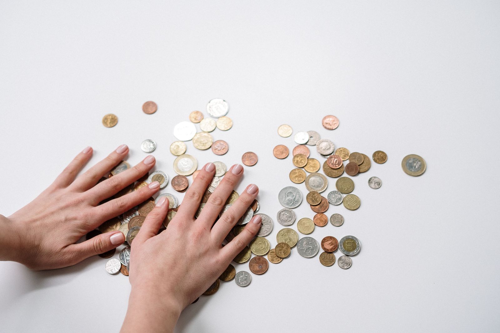 Coins and a travel budget, because the cheapest ticket is not always the cheapest trip