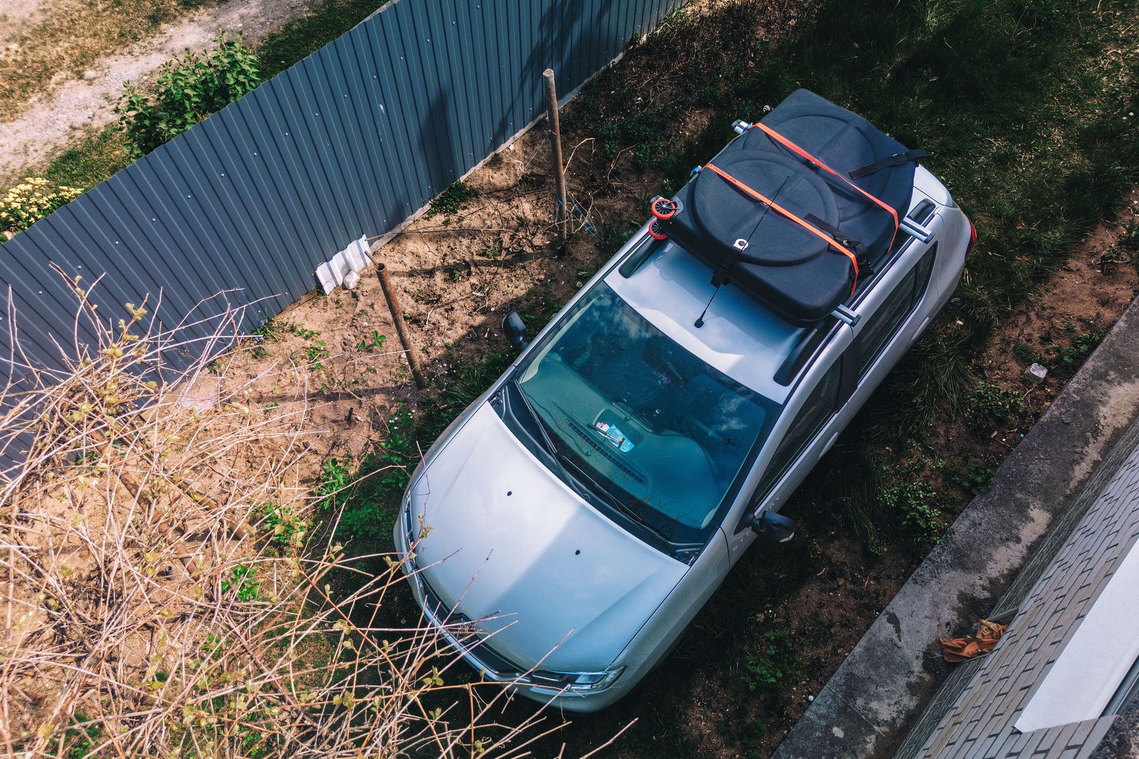 Suitcases loaded into an SUV, the simplest door-to-door option for families