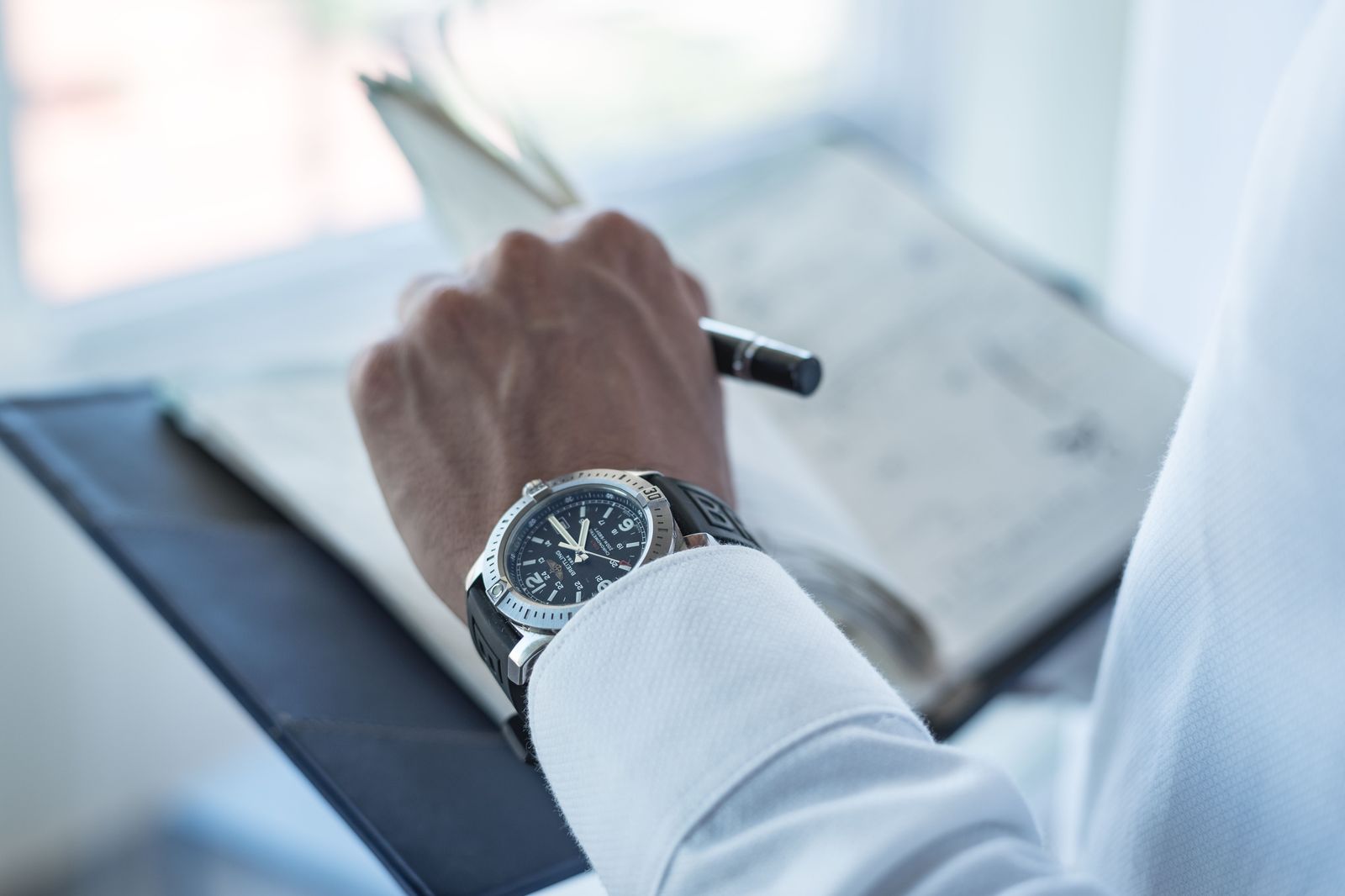 Hourly pricing buys a car and chauffeur that wait for you; flat pricing buys a single journey