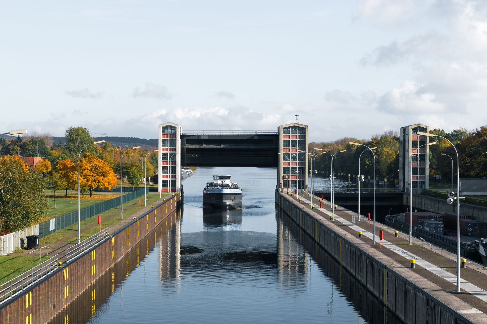 A cargo ship in a lock on the Welland Canal, a working water route you can watch from the road