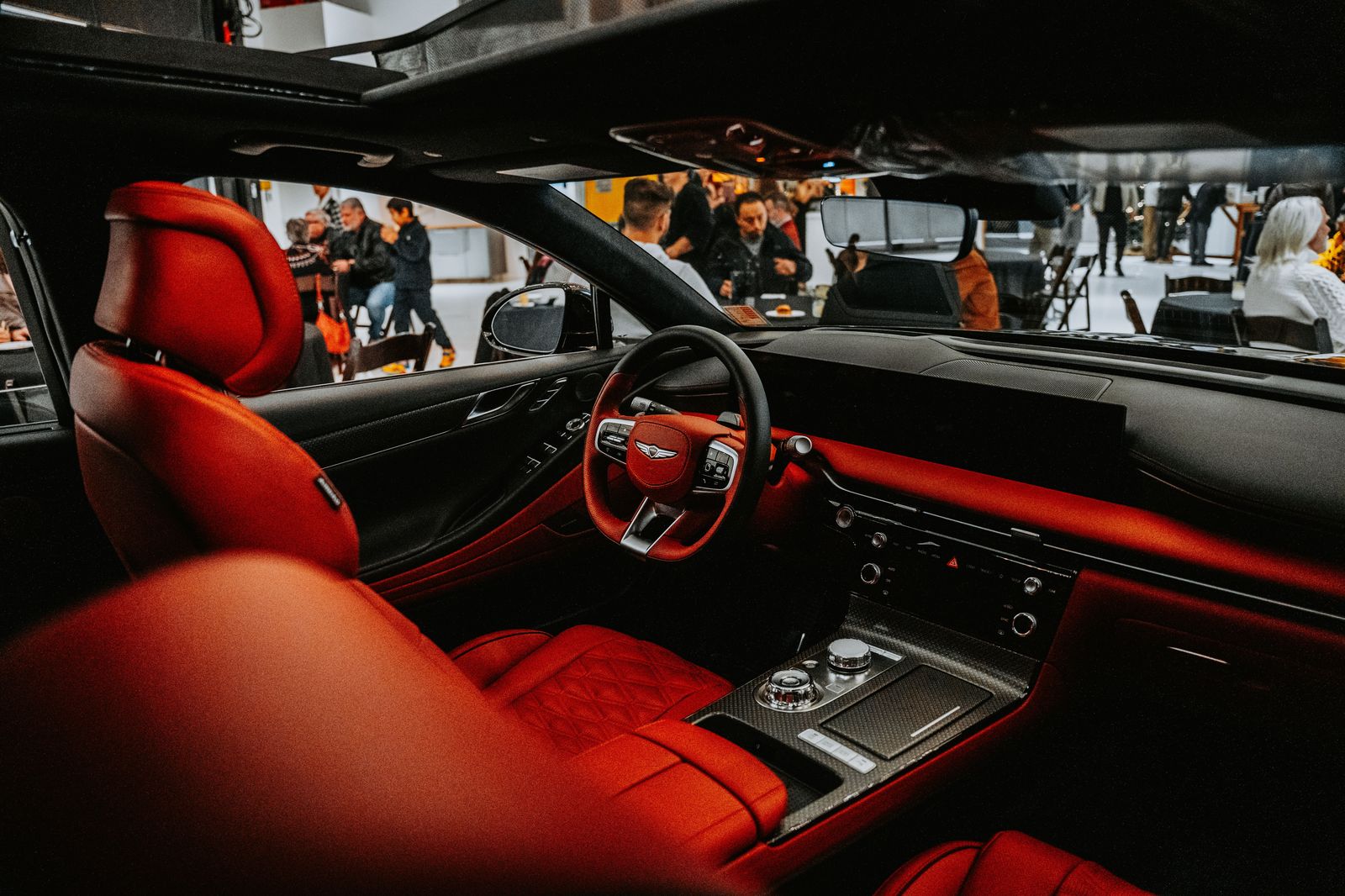 A quiet leather rear seat, which matters more on a nine-hour drive than on an airport run