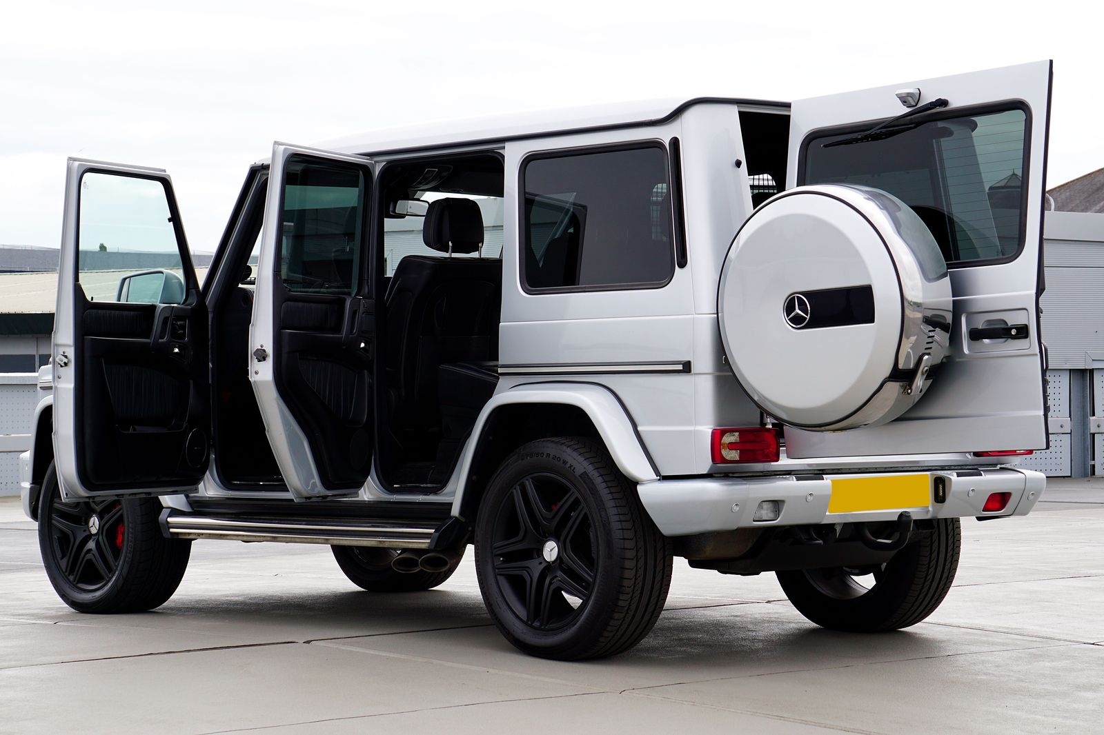 A chauffeur's job starts with a named booking, a flight number and a door held open