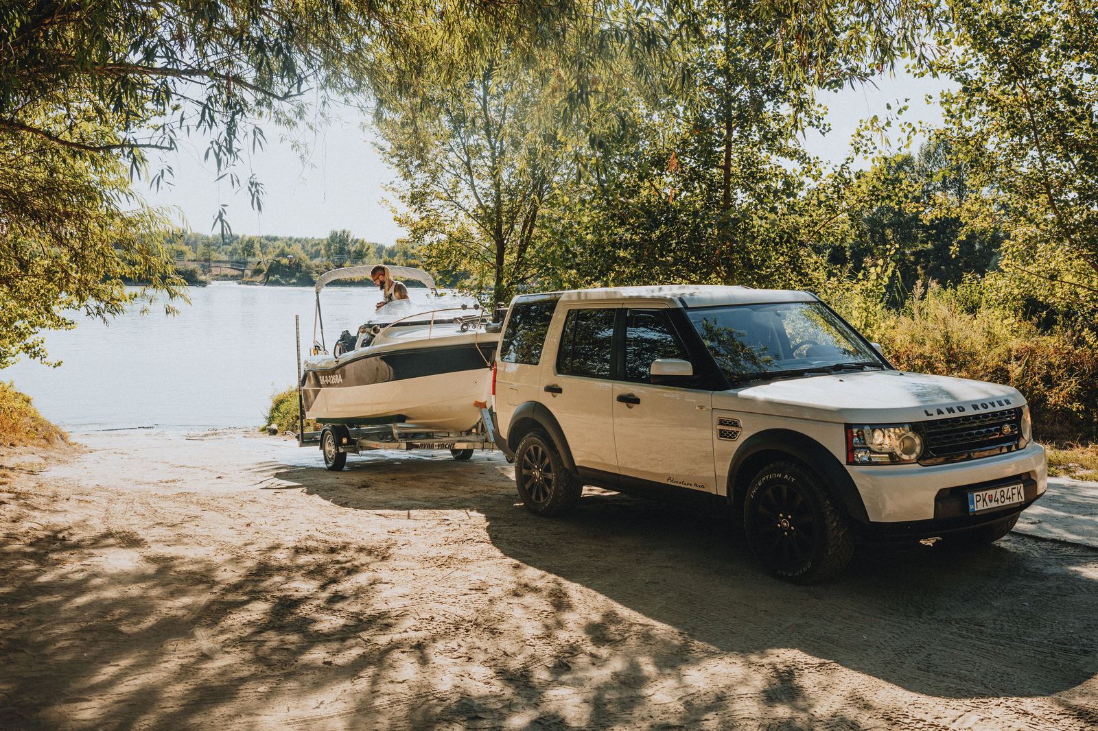 A chauffeured SUV waiting for travellers returning to the Kempenfelt Bay waterfront