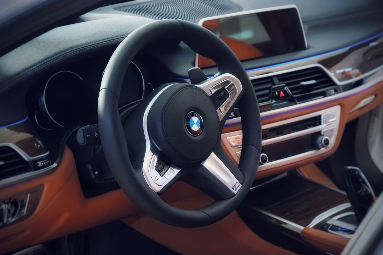 Gloved hands on the wheel: smooth, unhurried driving is part of the standard