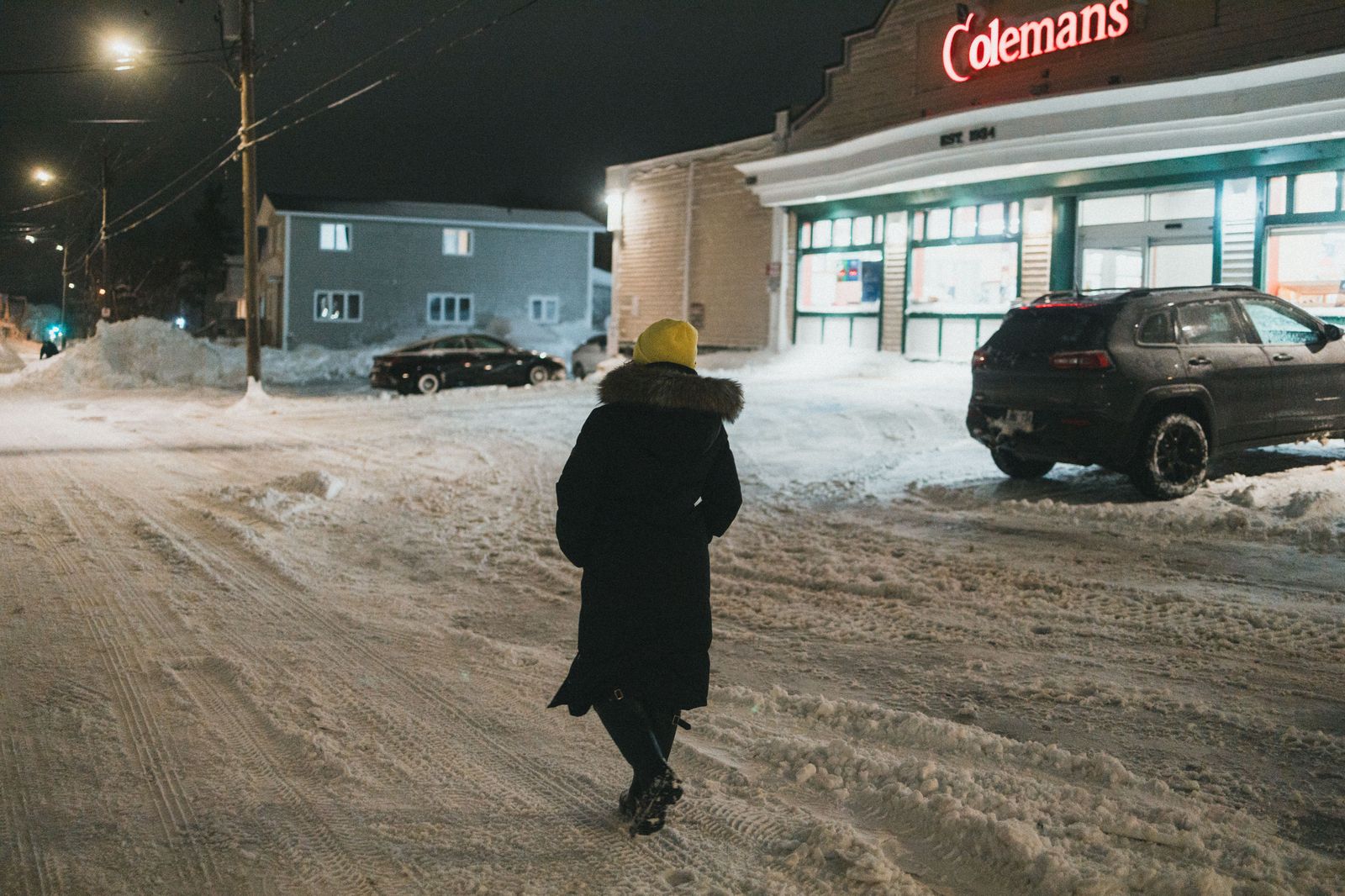 An executive SUV on a snowy Toronto street, the winter workhorse of the fleet