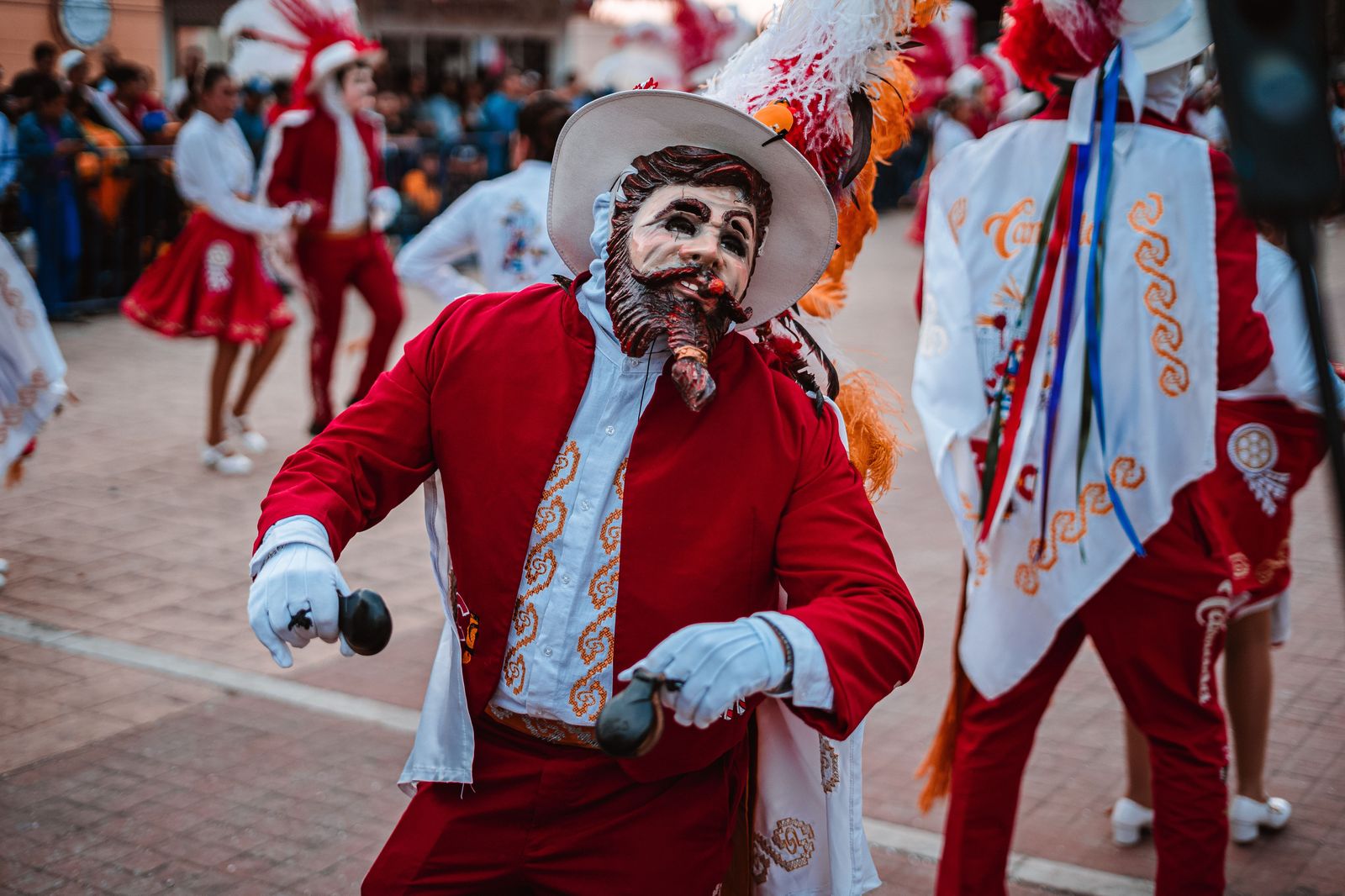 Masqueraders in full costume on the Grand Parade route