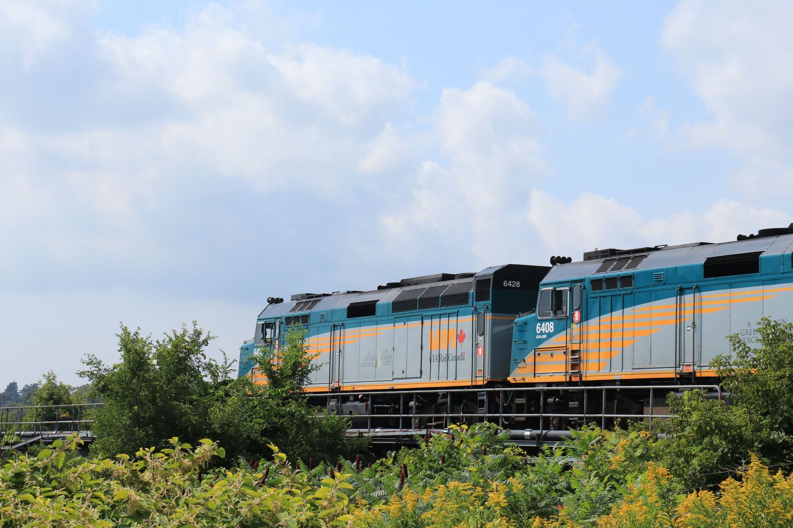 A commuter train running through the Ontario countryside