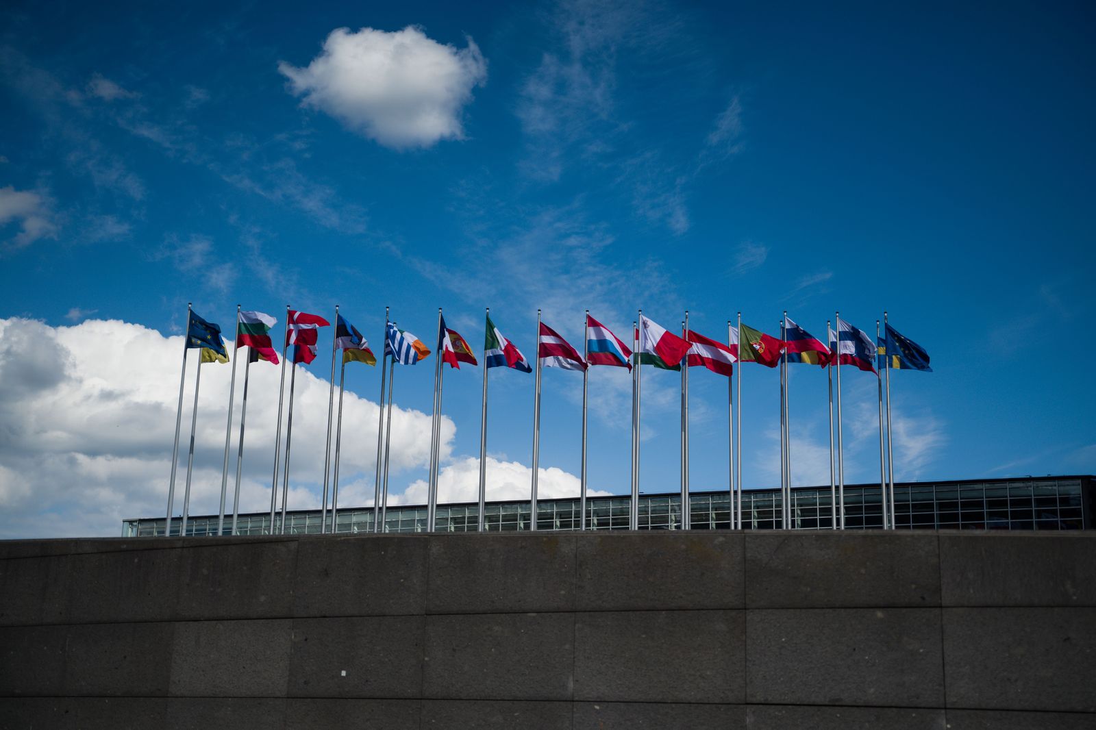 Row of national flags outside a venue hosting an official visit