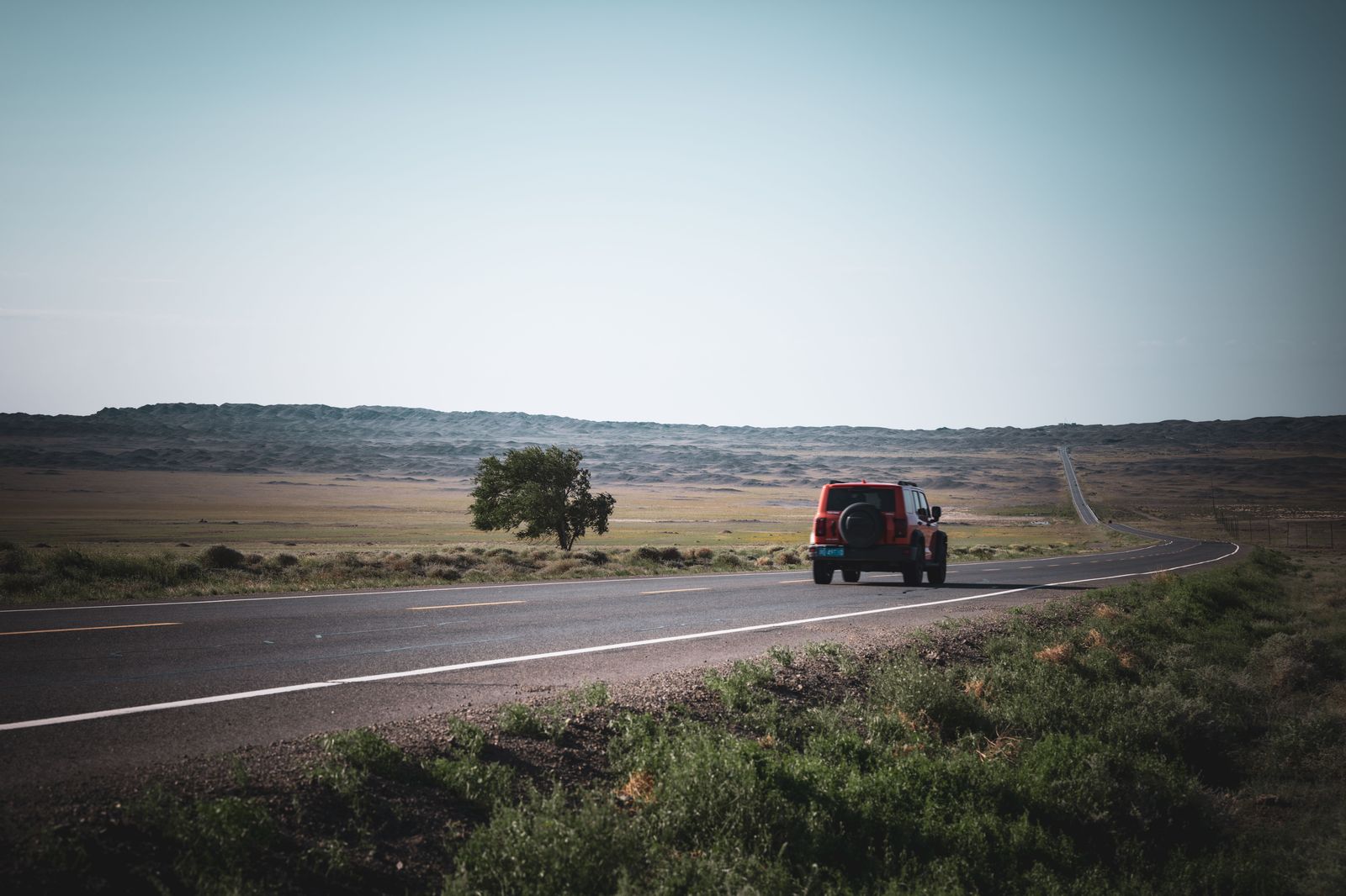 Black SUV on an Ontario highway in daylight
