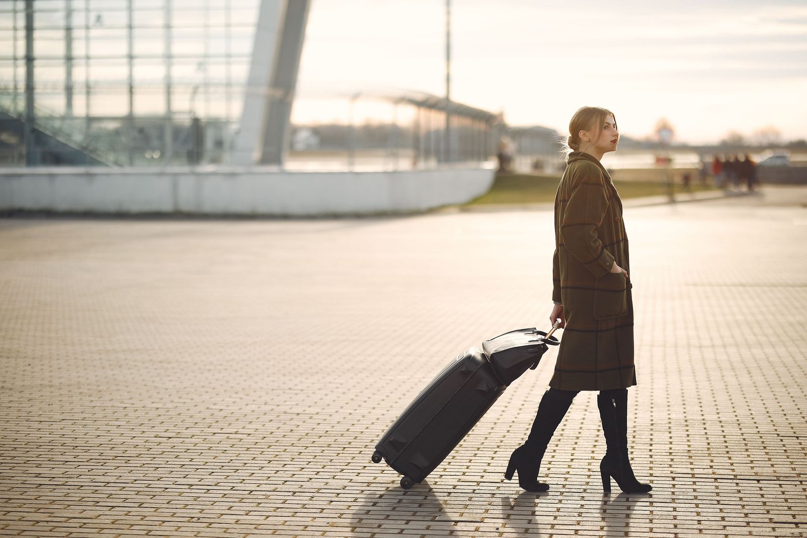 A business team walking together through an airport terminal