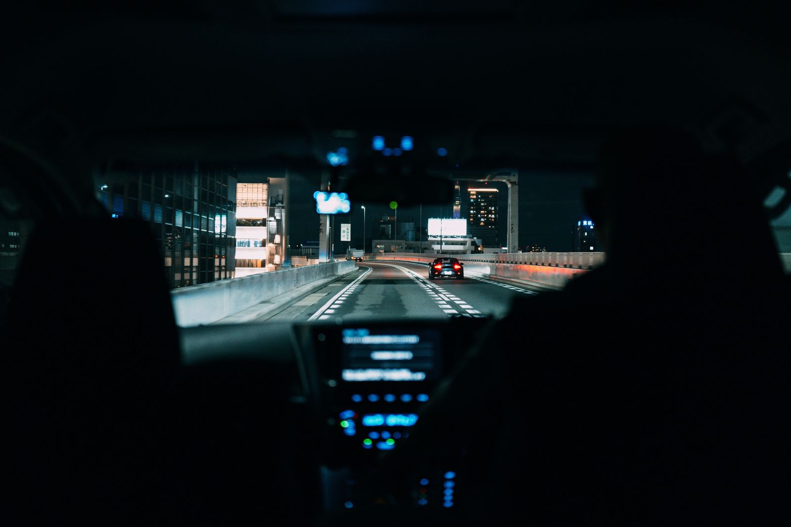 View from the back seat of a private car heading to Pearson at night